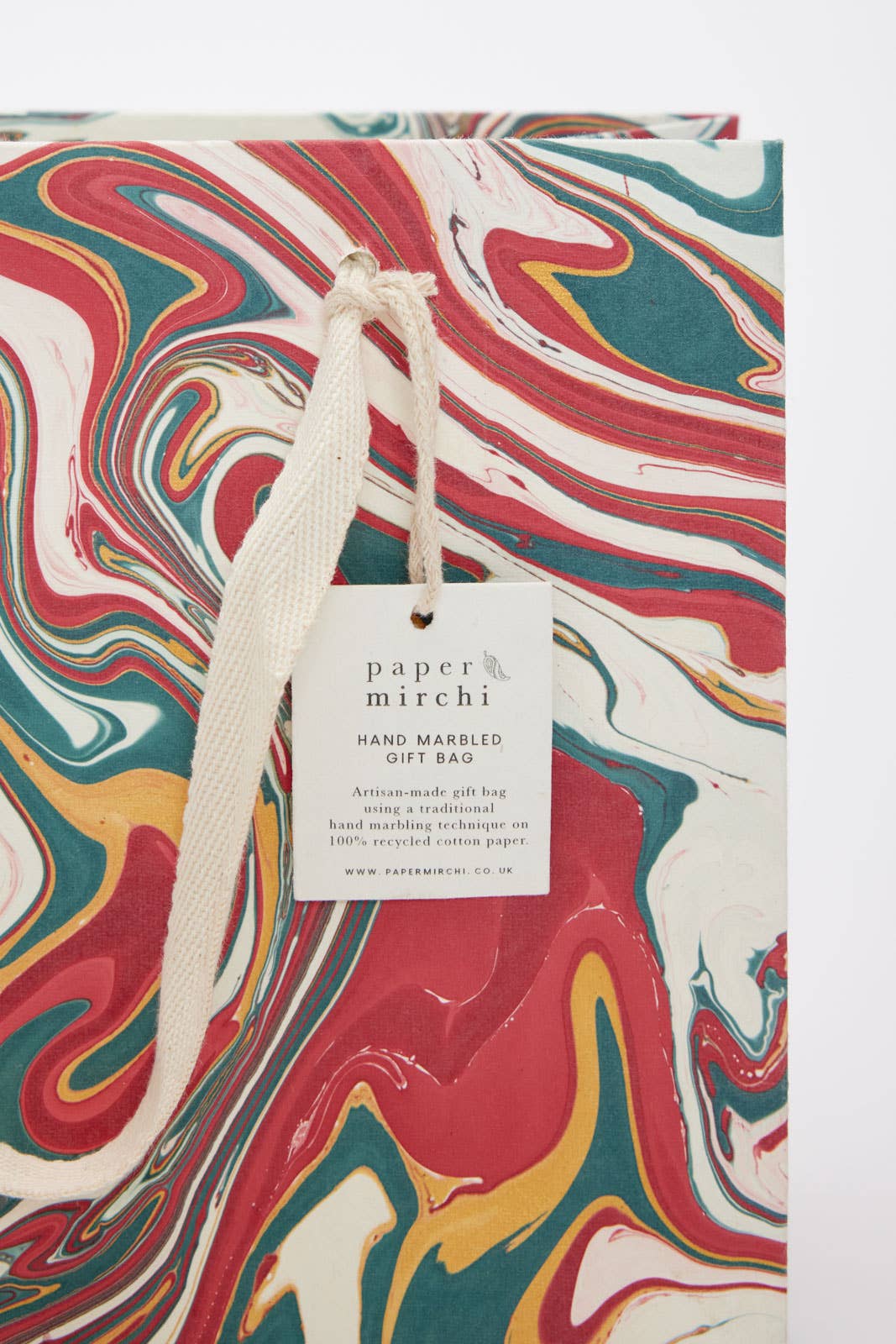 Hand marbled gift bag in Christmas Splendour design with cotton rope handle, perfect for stationery store packaging needs.