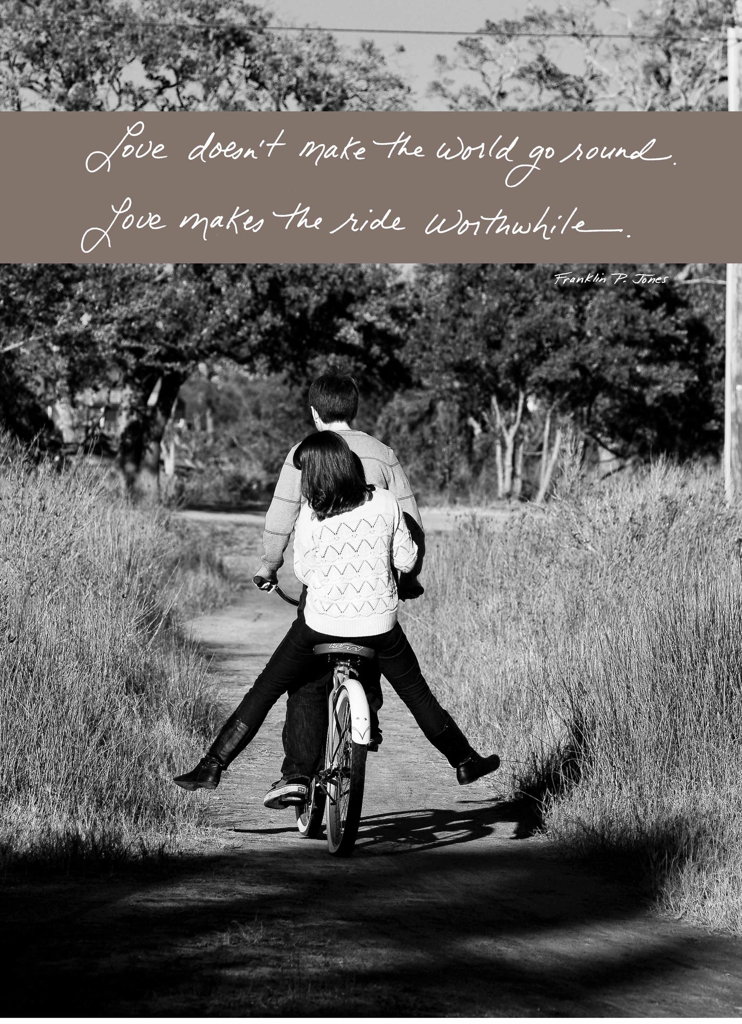 Couple riding a bicycle with quote 'Love doesn't make the world go round, Love makes the ride worthwhile' from stationery store product 436L.