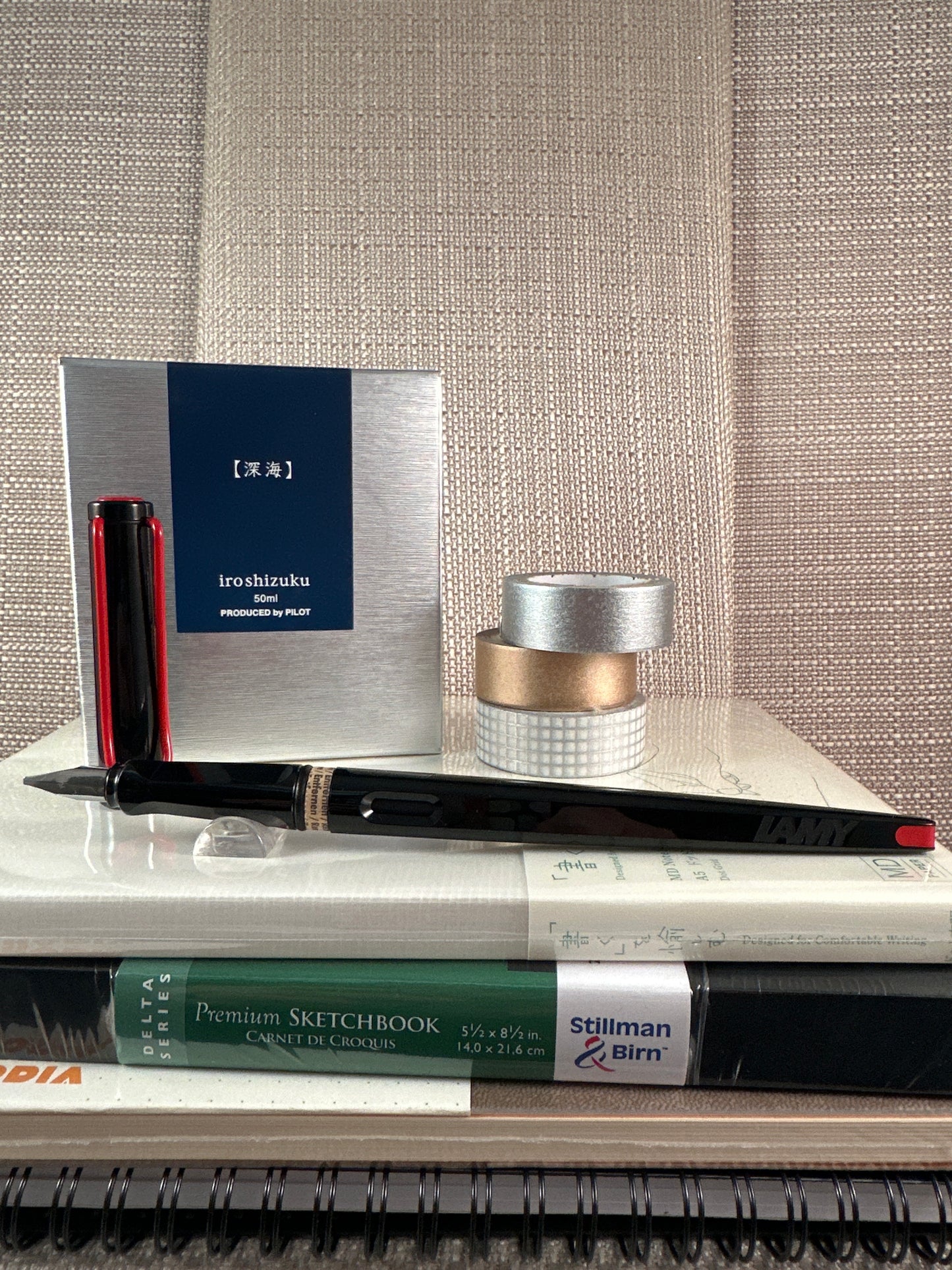 LAMY Joy Calligraphy Fountain Pen with stationery items in a store display setting.