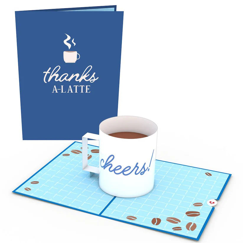 Pop-up card featuring a coffee cup with 'Thanks A Latte' design from a stationery store, showing open card with coffee bean decoration.