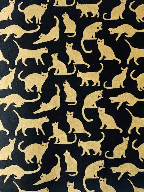 Cat, gold on black paper