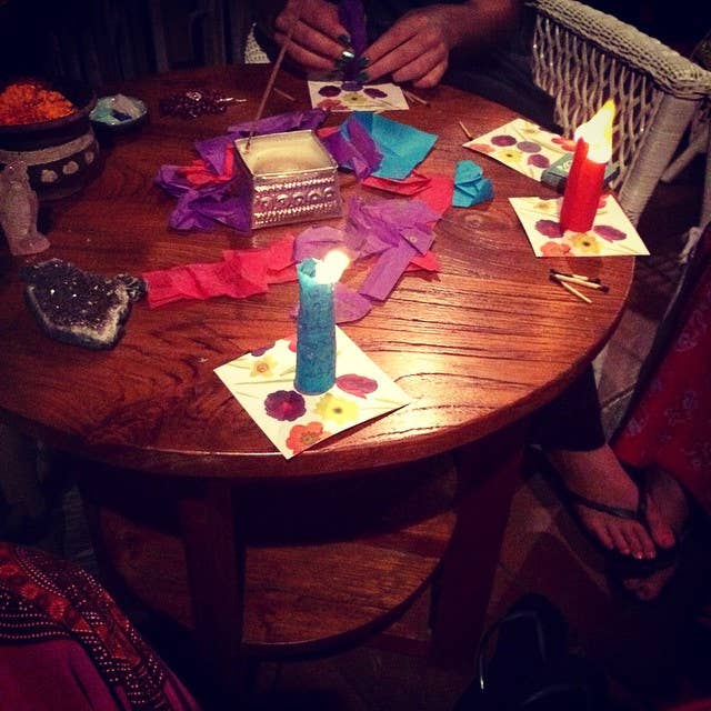 Dandelion Prayer Mini Kit with wish papers and candles on table, part of Flying Wish Paper kit from stationery store