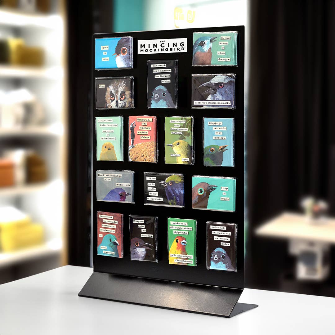 Colorful bird-themed refrigerator magnets display in stationery store featuring Sunshine Magnet collection.