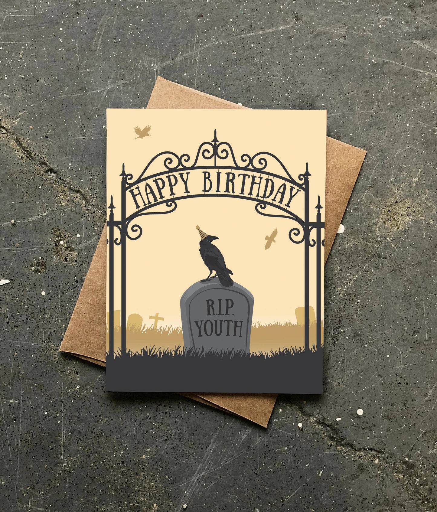 RIP Youth Funny Birthday Card with crow and tombstone design, stationery store, humorous dark birthday card with kraft envelope.