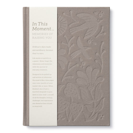 Book 'In This Moment' with embossed floral design, available at our stationery store, a unique addition to your collection.