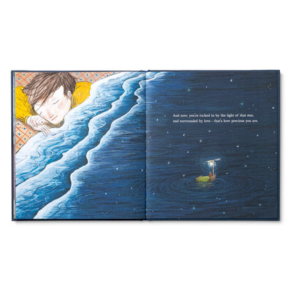 Open book titled 'One More Book Before Bed' showing an illustration of a child and starry night, available at our stationery store.