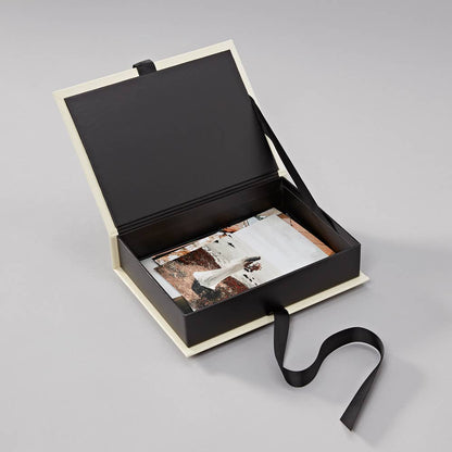 Heritage Line small photograph box with ribbon closure, perfect for storing photos and trinkets from a stationery store.