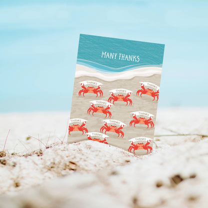 A2 'Many Thanks' card with crabs on a beach, blank inside, eco-friendly recycled paper. Available at stationery store.