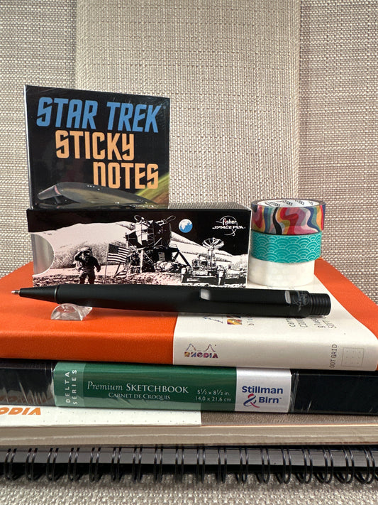 Fisher Space Pen with Star Trek sticky notes on stationery store display