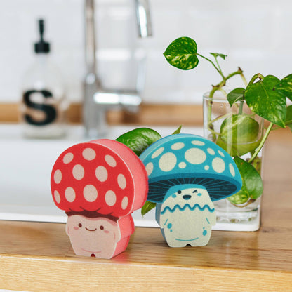 Sponges Fun Guys-2 mushroom kitchen sponges on a counter, perfect for a magical shine. Available at your local stationery store.