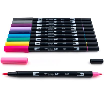 Dual Brush Pen Art Markers Galaxy 10-Pack featuring updated colors with flexible brush and fine tips, available at stationery stores.