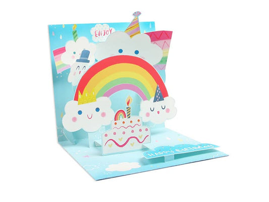 Happy Clouds & Rainbows pop-up birthday card with colorful artwork and glitter, available at stationery store.