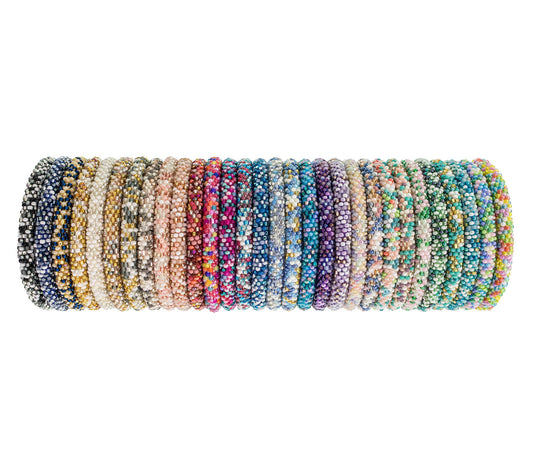 Colorful 2024 Spring and Summer Party Pack Roll-On® Bracelets, handmade with speckled designs, available at stationery store.