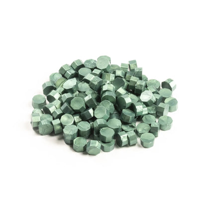 Emerald wax beads for creative sealing from a stationery store, ideal for envelopes, packages, and holiday cards.