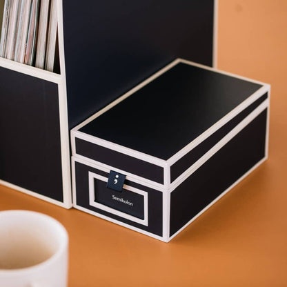 Heritage Line Business Card Box from Semikolon on desk, ideal office organization, available at stationery store.