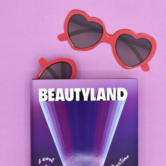 Heart-shaped sunglasses bookmark featured with "Beautyland" book - perfect stationery store gift for summer reading enthusiasts.