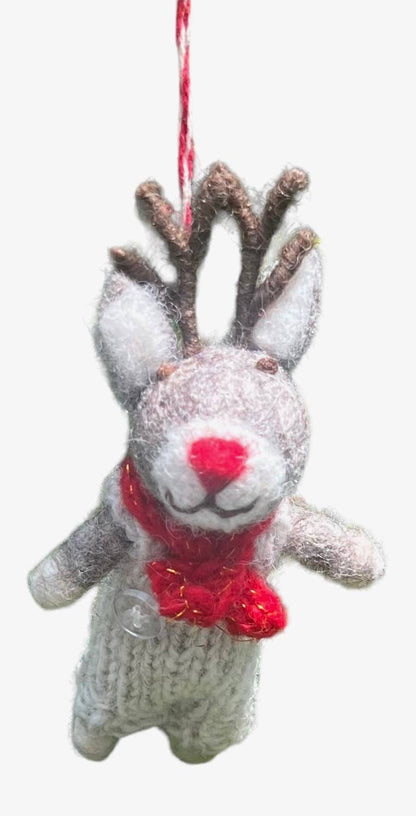 Handmade felt ornament, reindeer knit, crafted in Nepal by women artisans, perfect for holiday decor, available at stationery store.