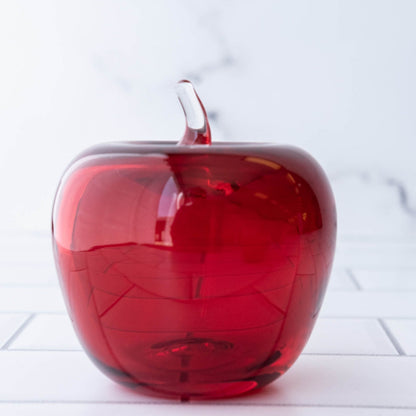 Blenko Red Apple Paperweight, a unique collectible for stationery stores, displayed on a white background.