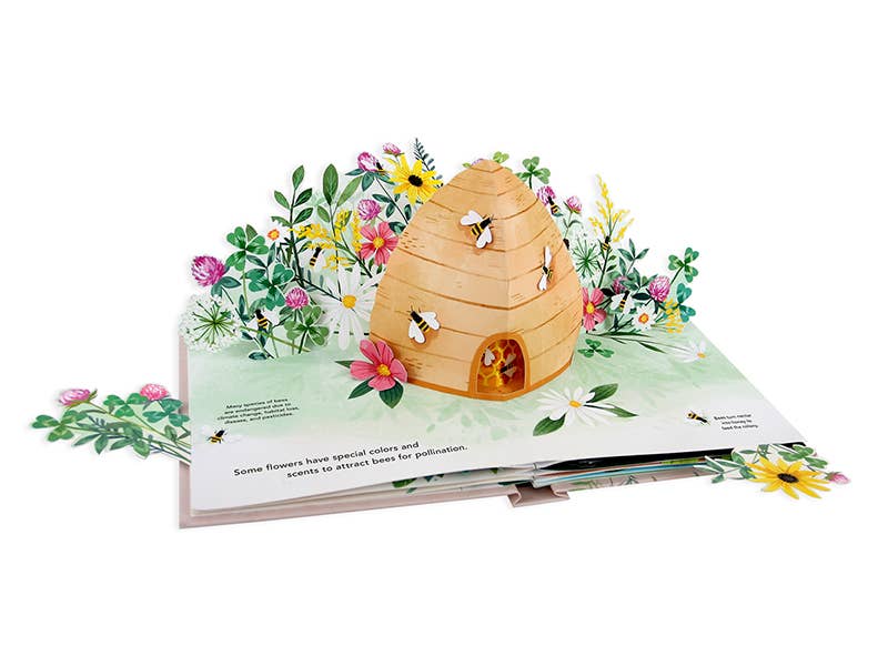 "Flora: A Botanical Pop-Up Book page with beehive pop-up and colorful flowers, ideal for stationery store enthusiasts."