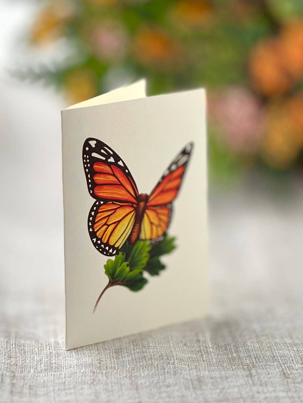 Butterflies & Buttercups pop-up greeting card with butterfly design, available at stationery stores.