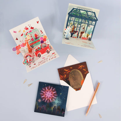 Dinner Date Pop-Up Cards with colorful artwork and gold foil finish, perfect for Valentine's Day, available at your local stationery store.