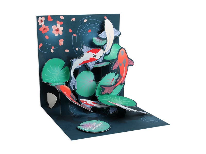 3D Koi Pop-Up Card with vibrant artwork and glitter finish, perfect for various occasions. Available at stationery stores with white envelope.