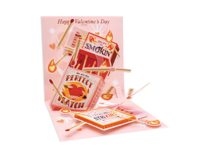 Perfect Match Pop-Up Card with colorful artwork, Valentine’s message, and matchstick design from a stationery store.