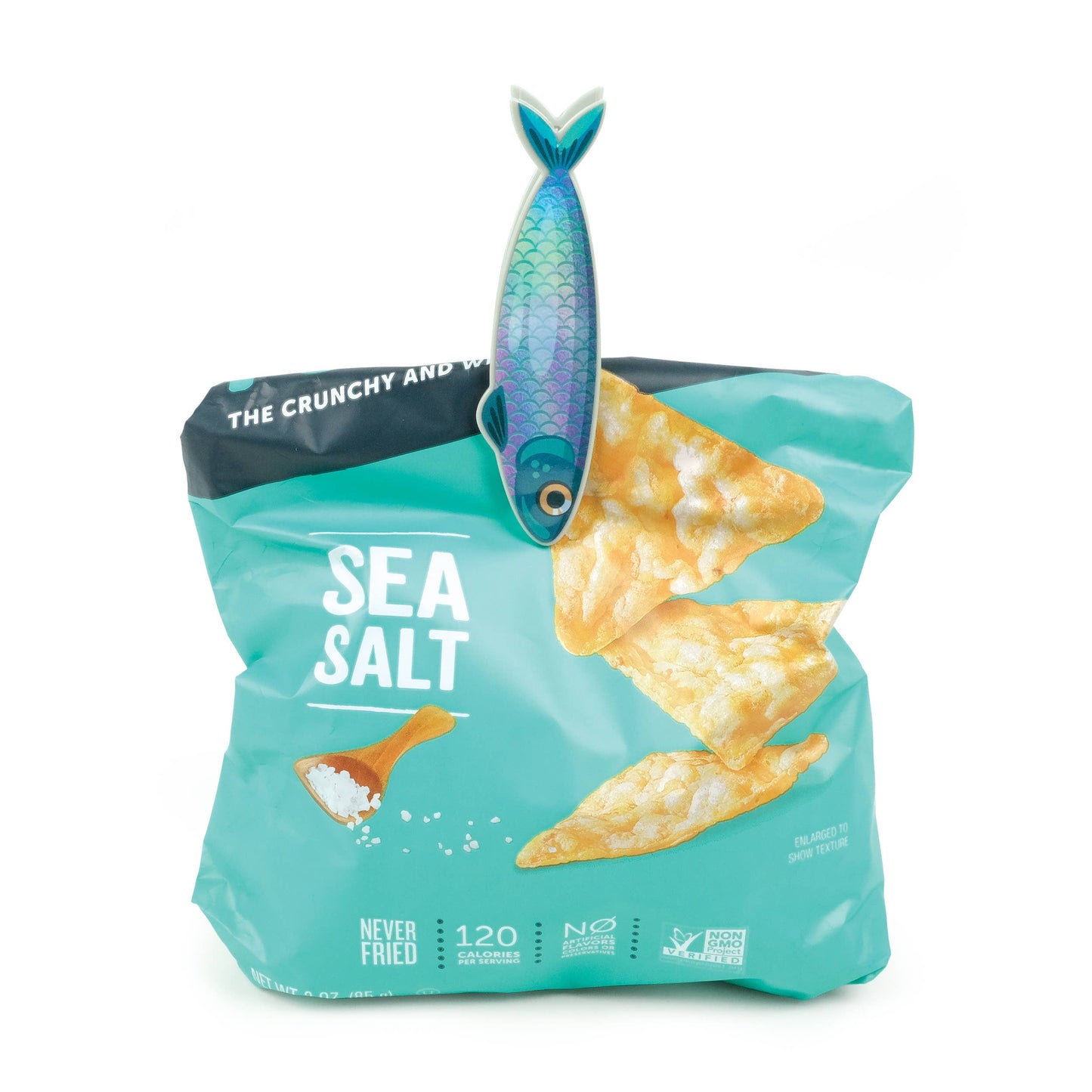 Fish 'N Clips sardine bag clip sealing a sea salt chip bag, showing iridescent finish. Ideal stationery store find, set of 4 by Fred Studio.