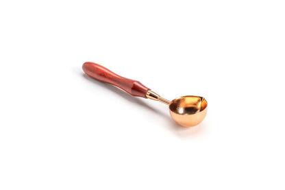 Mahogany red wood stained handle with rose gold melting spoon for wax sealing, available at the stationery store. Perfect for 4 melting beads.