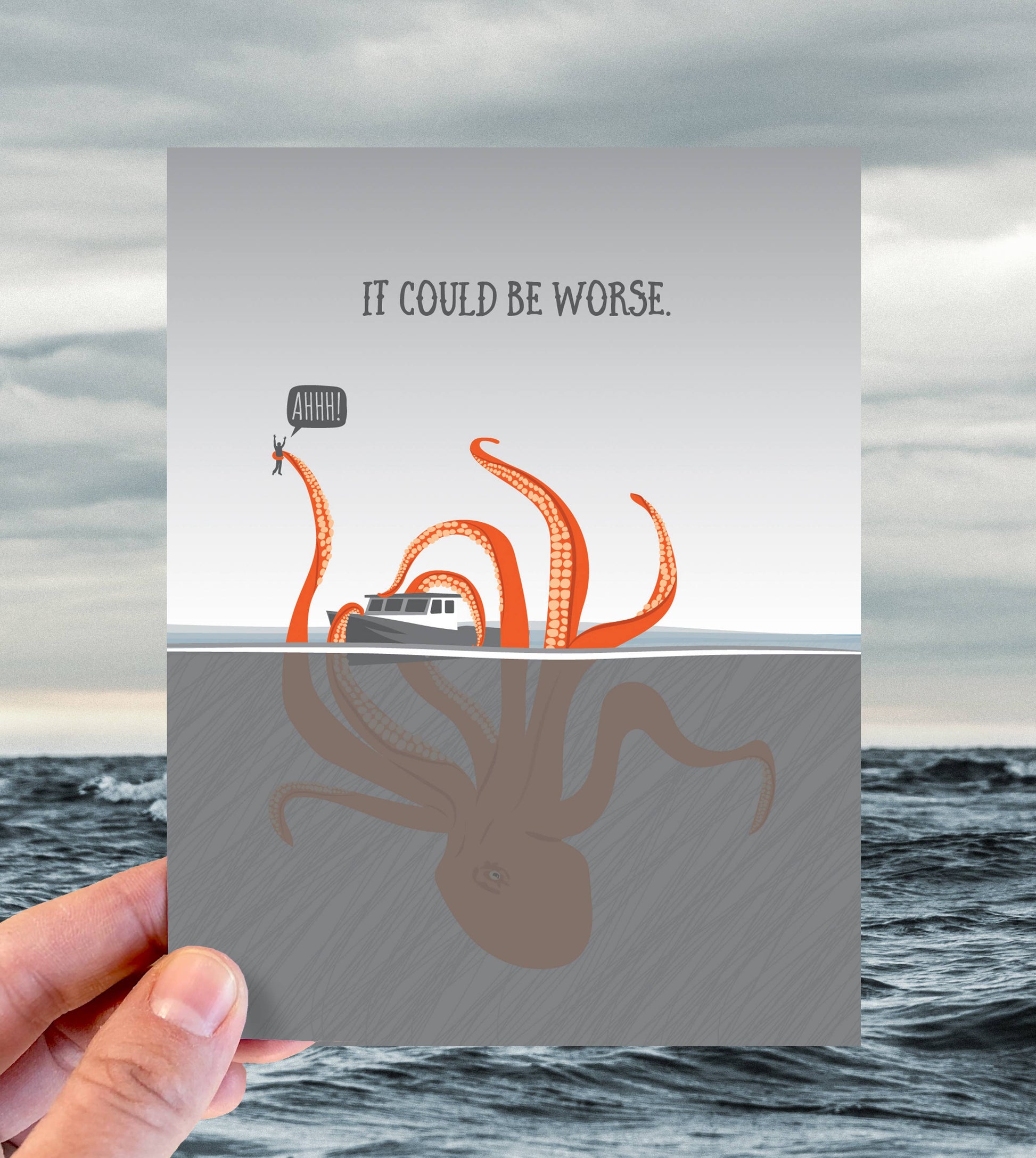 "Could Be Worse Kraken Card" featuring playful kraken scene, A2 size, eco-friendly recycled materials, stationery store item.