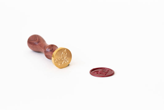 Holly Wax Seal Stamp with brass face and rosewood handle from Modern Legacy Paper Company, perfect for stationery store crafts.