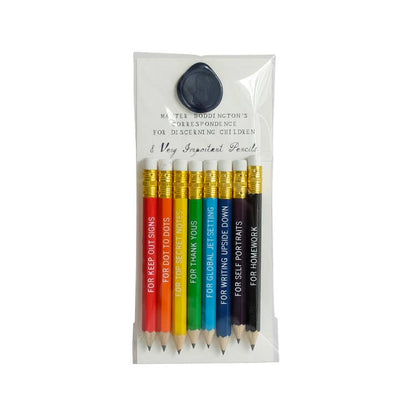 Set of 8 mini pencils for all occasions with colorful bodies from stationery store. Each pencil labeled for a special occasion.