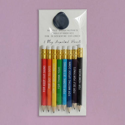 Set of 8 assorted mini pencils labeled for occasions; perfect for stationery store enthusiasts. Includes graphite core for versatile use.