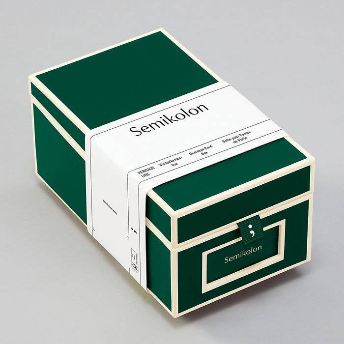 Green Semikolon Business Card Box for organized storage, includes index cards and tabs, perfect for office or home. Available at stationery store.