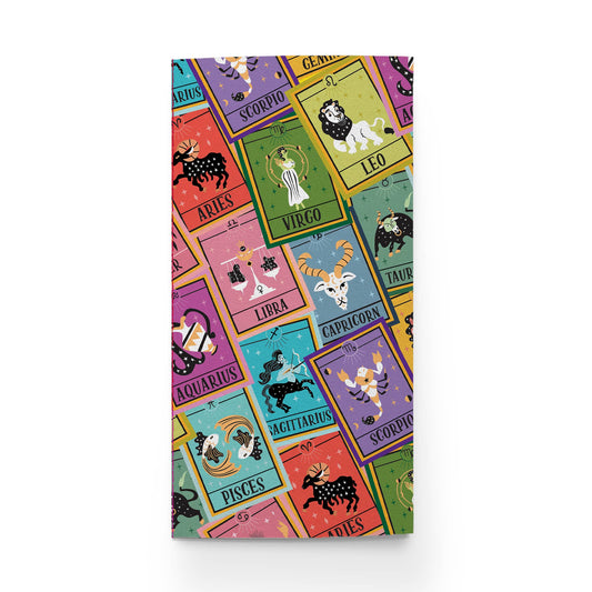 Zodiac-themed What's Your Sign Traveler Notebook with colorful astrology designs, ideal for journaling or scrapbooking. Available at stationery store.