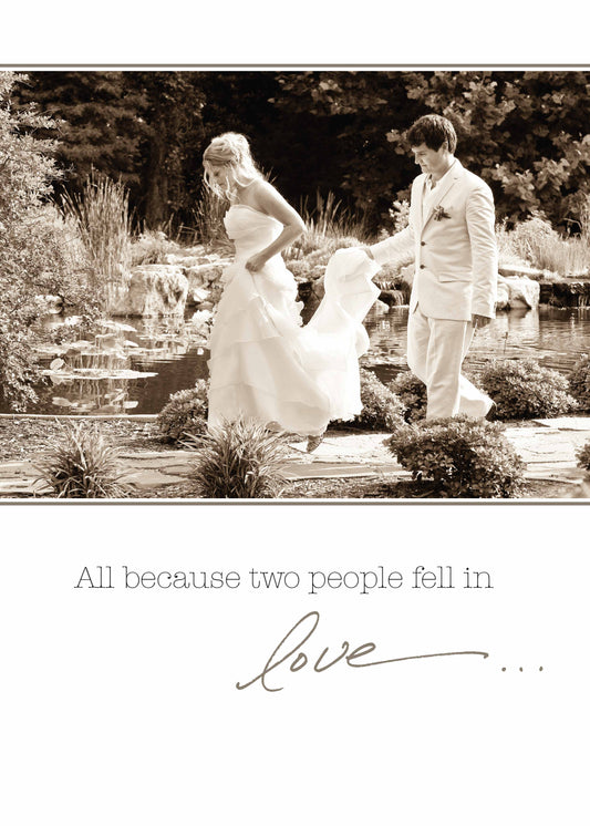 Wedding card with bride and groom, text 'All because two people fell in love', available at stationery store