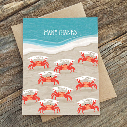 Many Thanks card featuring crabs with 'Thanks' banners, on recycled paper with kraft envelope; available at stationery store.