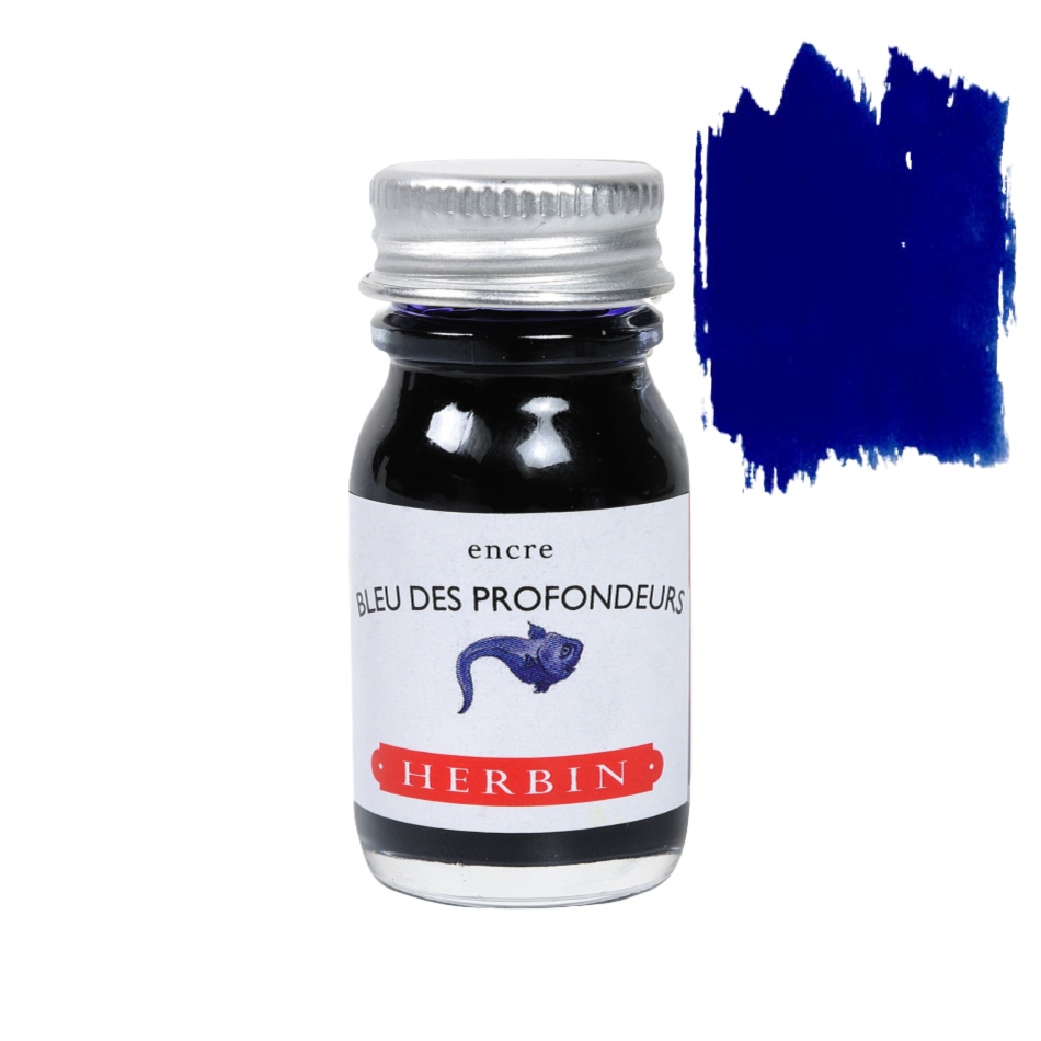 Close-up of a hand holding a Herbin Bleu Pervenche fountain pen ink 10ml bottle, elegant stationery from Paris, available in 35 colors