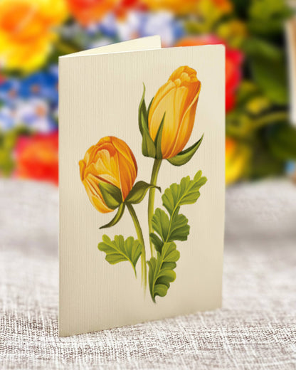 Sorbet Roses Pop Up Greeting Card with bold floral design, available at the stationery store, featuring elegant yellow and orange blossoms.