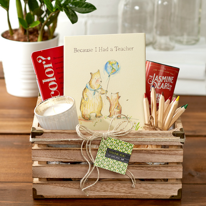 Alt Tag: Gift basket with 'Because I Had A Teacher' book, stationery items, and candles, perfect for a stationery store gift collection.