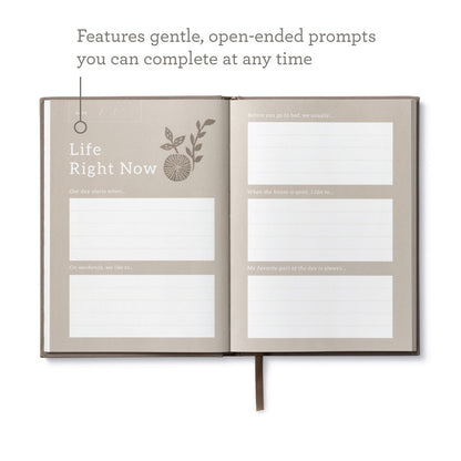 Open 'In This Moment' book from stationery store featuring prompts for reflection and writing.