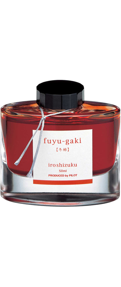 Elegant Iroshizuku Ink 50ml bottle in Fuyu-gaki color, showcasing Japanese craftsmanship. Available at stationery stores.