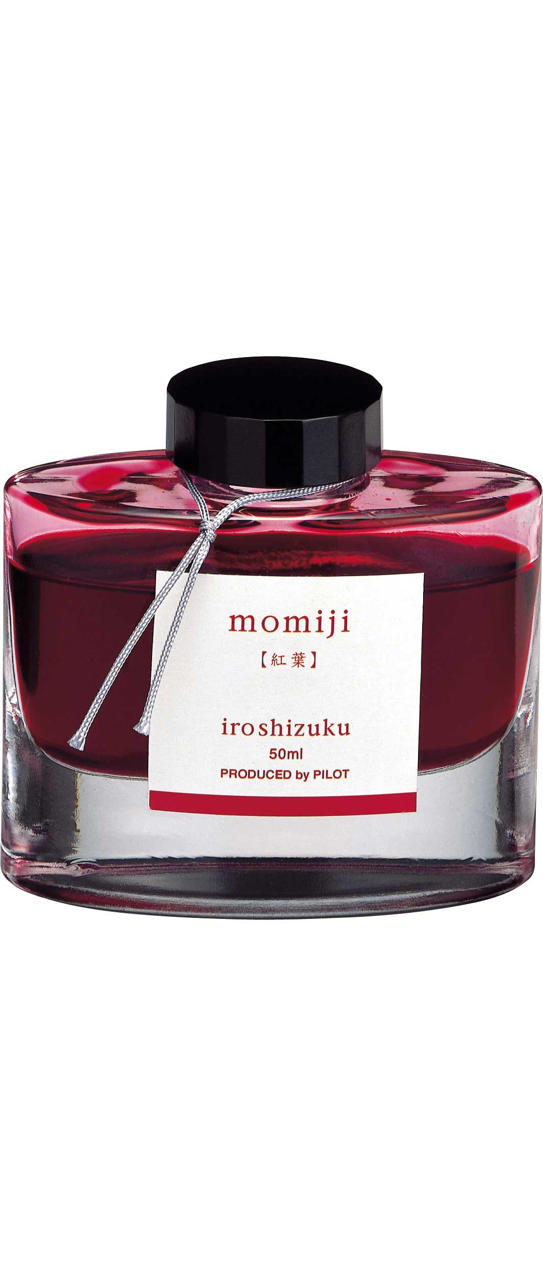 Iroshizuku Ink 50ml Bottle in Momiji color, showcased at a stationery store, highlighting Japanese craftsmanship and vibrant hues.