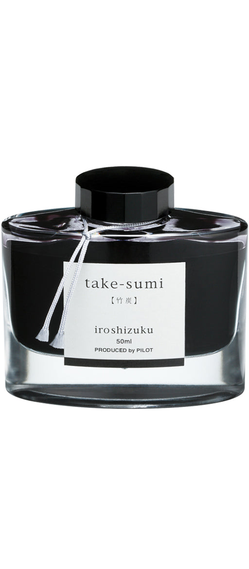 Iroshizuku Ink 50ml glass bottle in Take-Sumi black, showcasing Japanese craftsmanship, available at stationery stores.