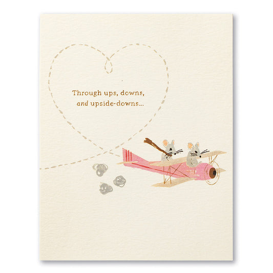 Love Muchly Anniversary card with mice in a plane, featured in a stationery store, expressing 'Through ups, downs, and upside downs.'