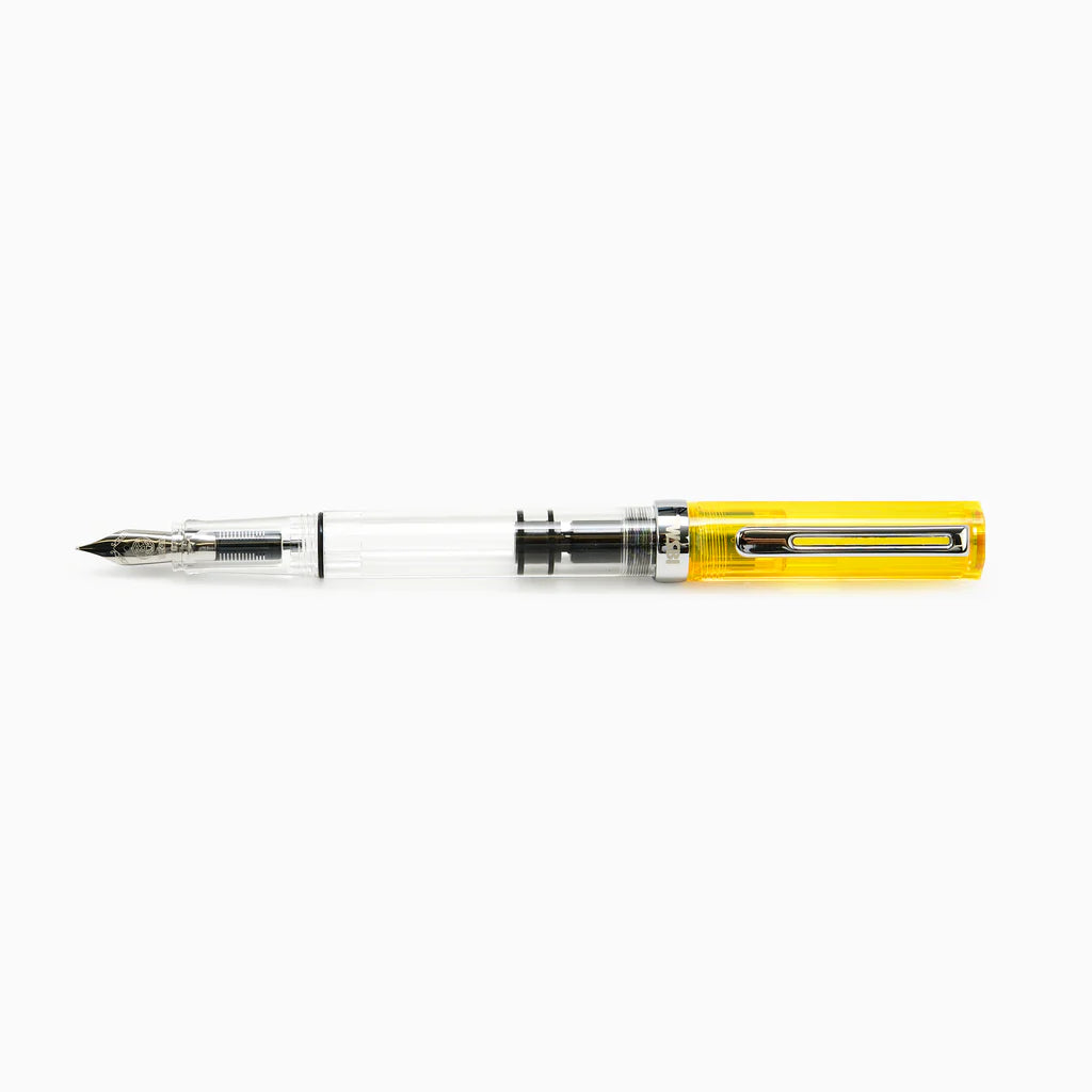 TWSBI ECO Transparent Yellow Fountain Pen with clear body, vibrant yellow accents, ideal for beginners and enthusiasts at stationery stores.