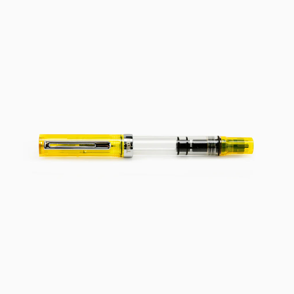 TWSBI ECO Transparent Yellow Fountain Pen with piston-filling system, ideal for stationery store collections, stylish and functional design.