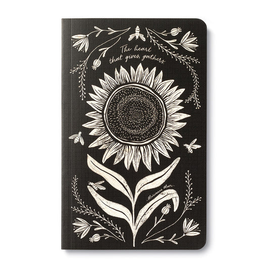 Alt Tag: Write Now Journal with sunflower design and 'The heart that gives gathers' quote, available at our stationery store.
