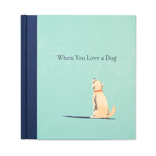 Book cover of 'When You Love a Dog', in vibrant blue and cream, available at our stationery store.