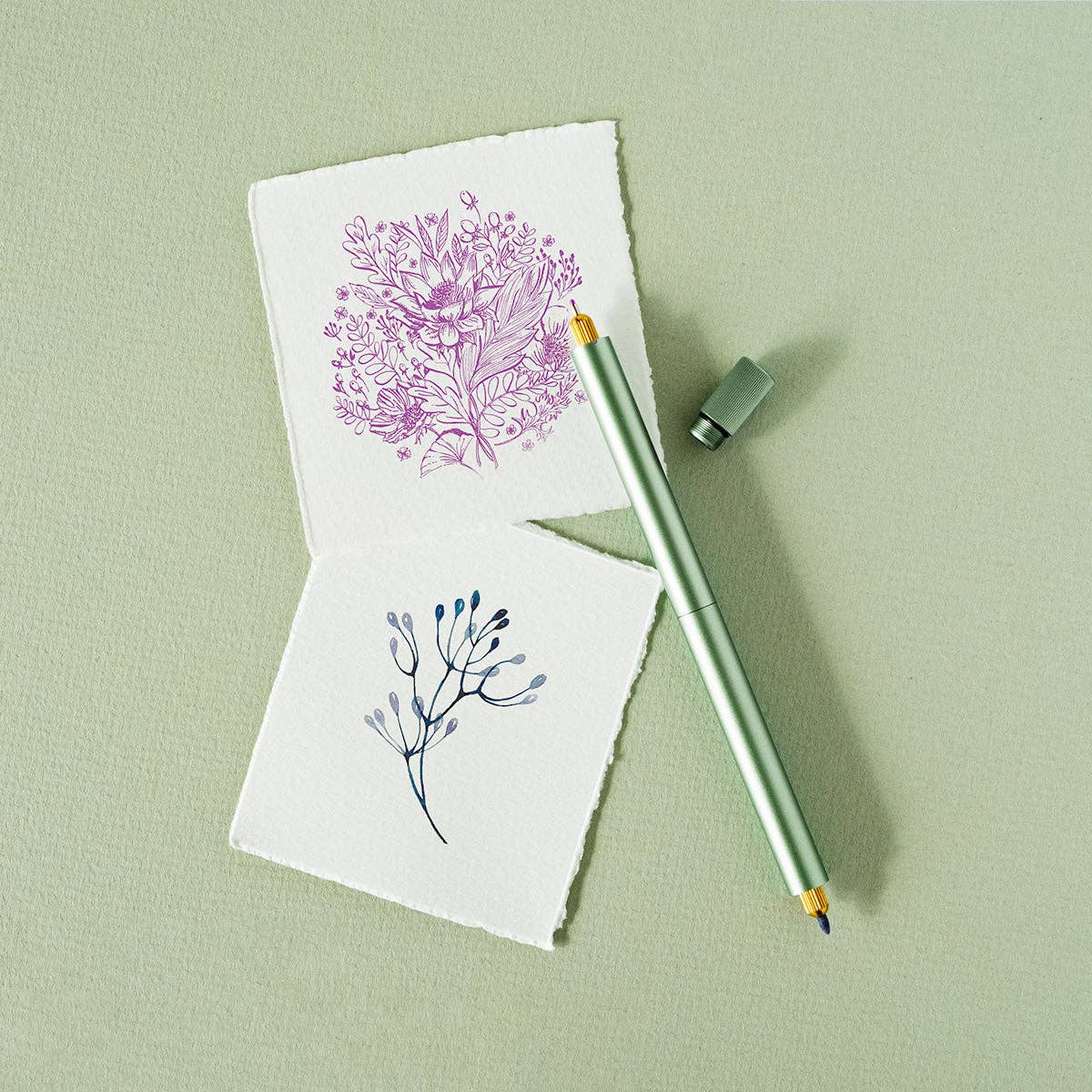 Sage Lumos Pro refillable multi-tip pen with drawn floral art, available at stationery store.